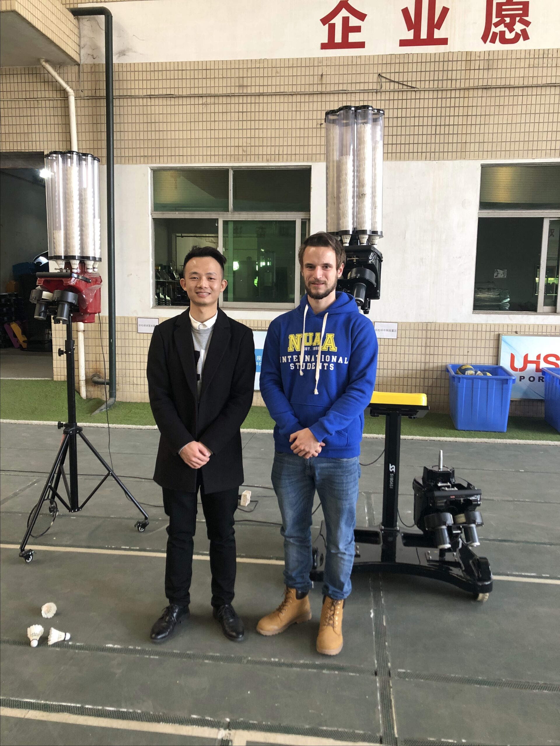 William with European customer at factory